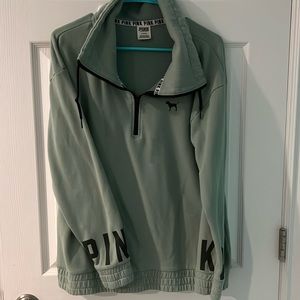 PINK 1/4 zip. Lightly worn.